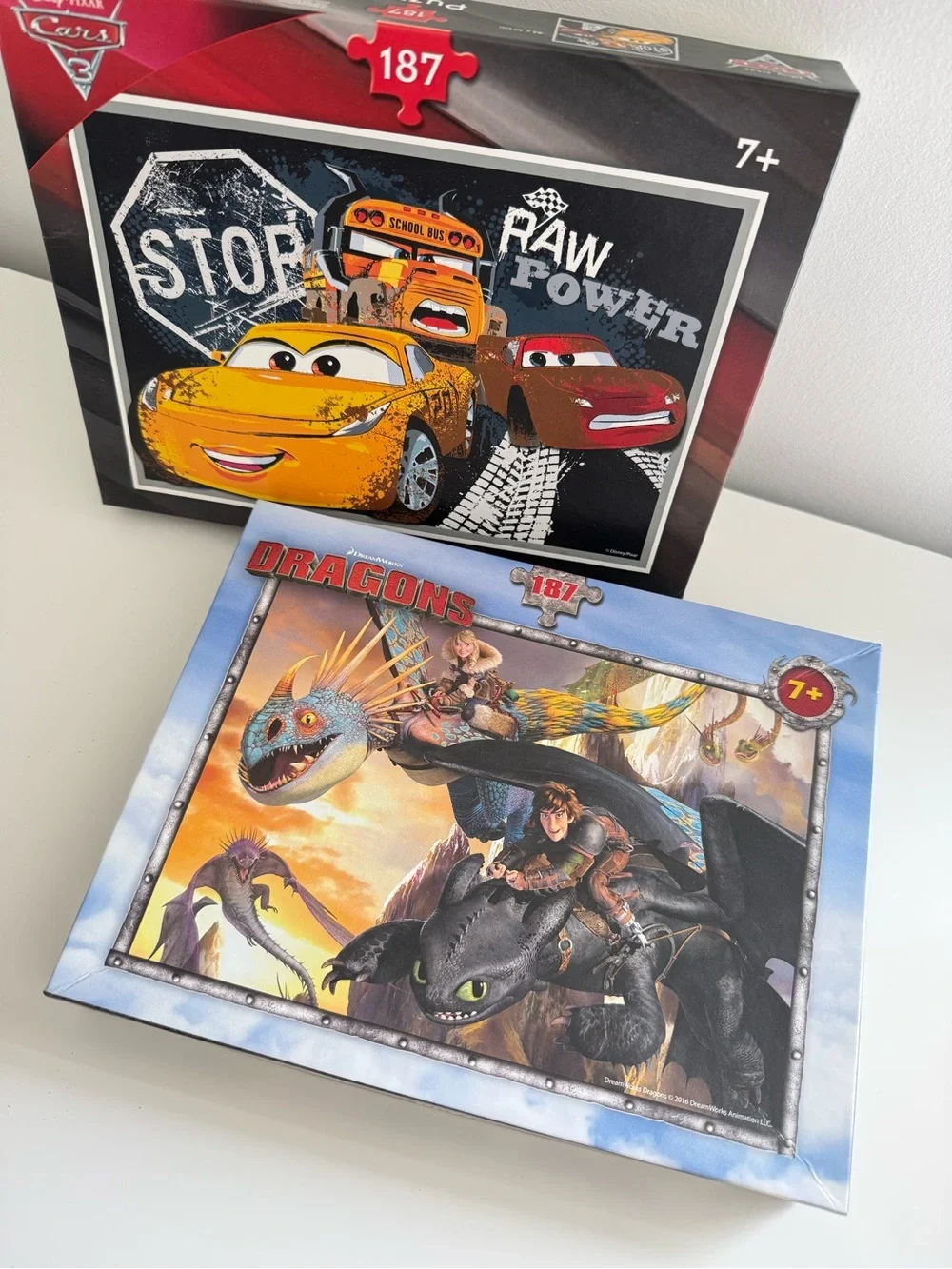 Set of 2 Kids Puzzles 187 pieces 7+years Disney Cars & How to Train your Dragon